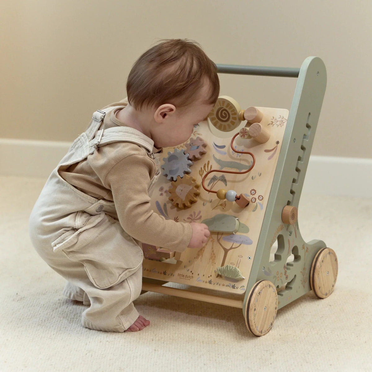 Child playing with the Little Dutch Safari Friends Wooden Baby Activity Walker