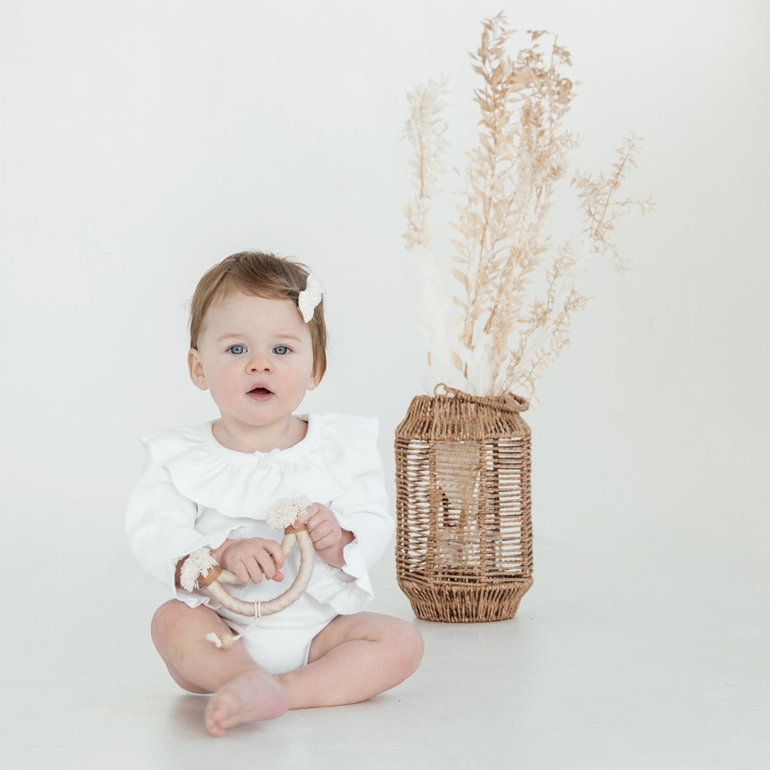 Snow Rib Ruffle Onesie
