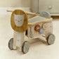 Little Dutch Safari Friends Ride-On Lion showing side activity gears