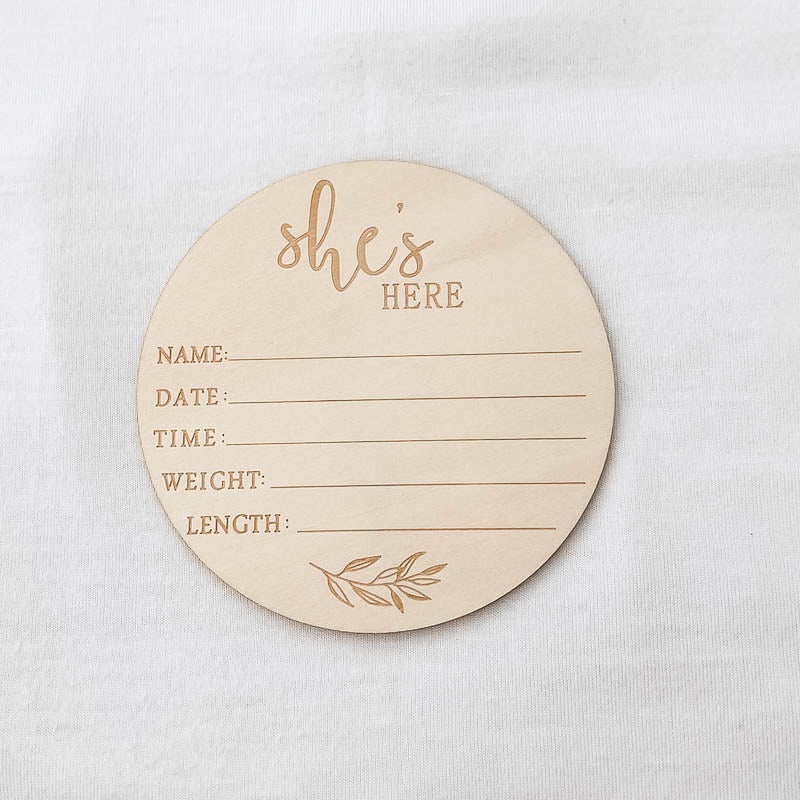 She's Here Wooden Baby Announcement Disc